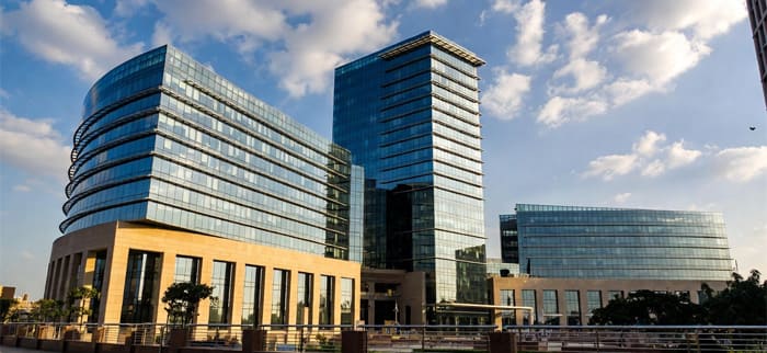 HK Packers and Movers moving furniture at Noida City Center office